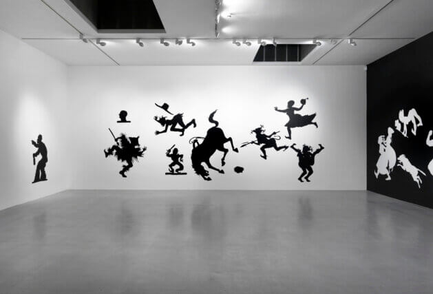 Installation view of Kara Walker 'We at Camden Arts Centre are Exceedingly Proud to Present an Exhibition of Capable Artworks by the Notable Hand of the Celebrated American, Kara Elizabeth Walker, Negress.' at Camden Arts Centre, 2013 - 2014. Photo: Marcus J Leith