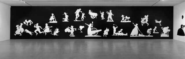 Installation view of 'Kara Walker: We at Camden Arts Centre are Exceedingly Proud to Present an Exhibition of Capable Artworks by the Notable Hand of the Celebrated American, Kara Elizabeth Walker, Negress.' at Camden Art Centre, 2013 - 2014. Photo: Marcus J Leith