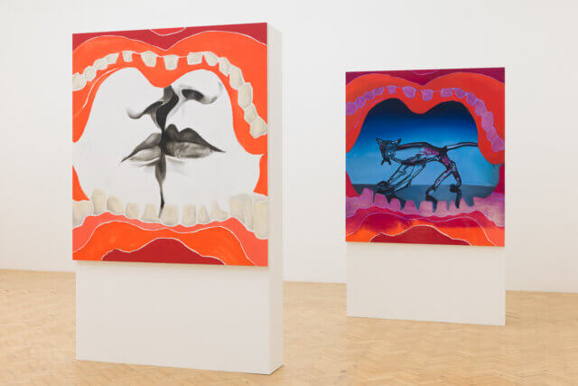 Two canvases painted. White gallery space.