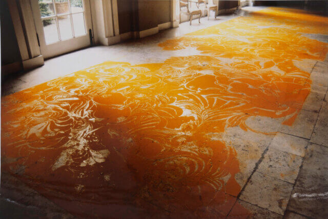 Shelagh Wakely, Curcuma sul Travertino (detail), 1991. Loose turmeric powder, dimensions variable. Courtesy ROOM Artspace, London.