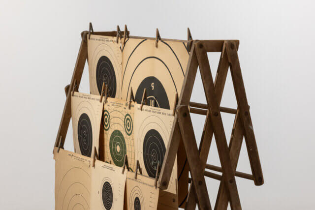 Lonnie Holley, 'Hung Out,' 2021
Wooden drying rack, 
rifle targets, clothes pins
Courtesy the artist, Edel Assanti and BLUM 
Photo: Rob Harris