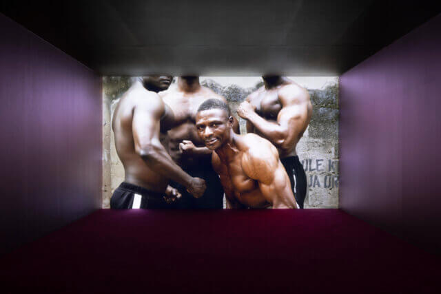 Karimah Ashadu, 'MUSCLE', installation view Tendered, Camden Art Centre, 2025. Courtesy the artist, Fondazione In Between Art Film, Sadie Coles HQ, London and Camden Art Centre. Photo: Andrea Rossetti.